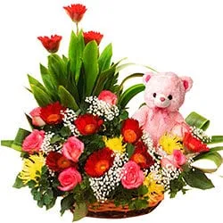 Sweetest Selection of Mixed Flowers and a Teddy Bear in a Basket
