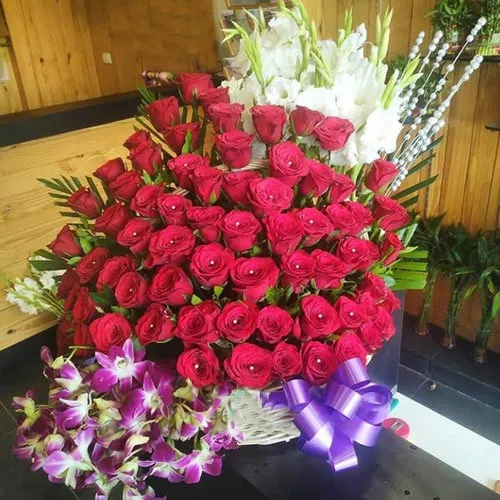 Marvellous Arrangement of Roses, Orchids N Tube Roses