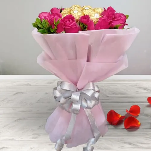 Beautiful Bouquet of Red Roses N Ferrero Rocher with Tissue Wrapping