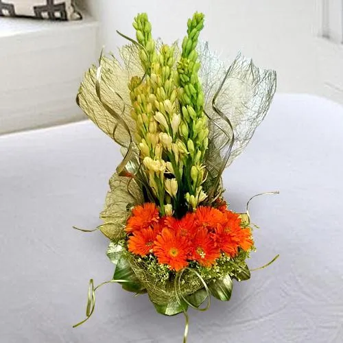 Send White Rajnigandha with Orange Gerberas Bouquet