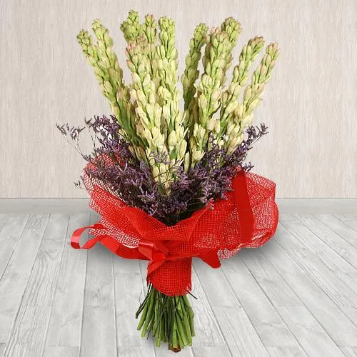 Elegant Hand-Designed Bouquet of Rajnigandha in Tissue Wrapping