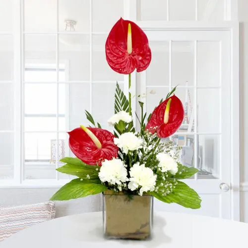 Buy Anthodium n Carnations in Glass Vase
