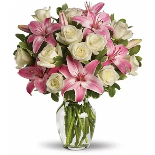 Display of Lilies n Roses in Glass Vase