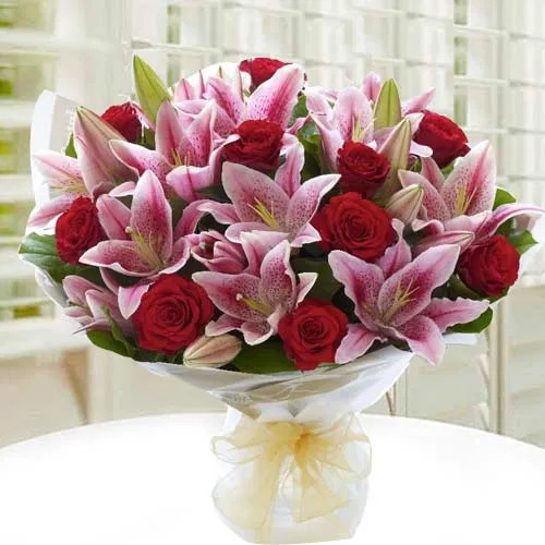 Radiant Hand Bunch of Roses & Lilies