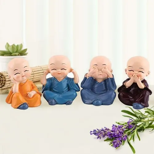 Attractive Set of 4 Buddha Monks Figurines