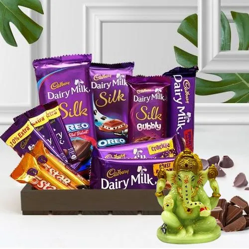 Dreamy Cadbury Delight Gift Basket with Glowing Ganesha Idol