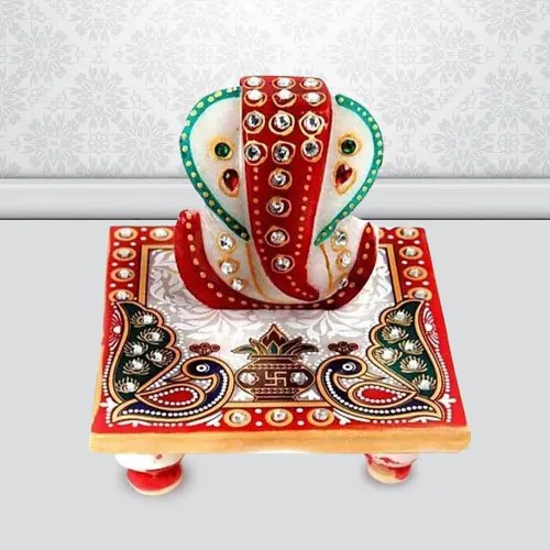 Exclusive Marble Ganesh Chowki with Peacock Design