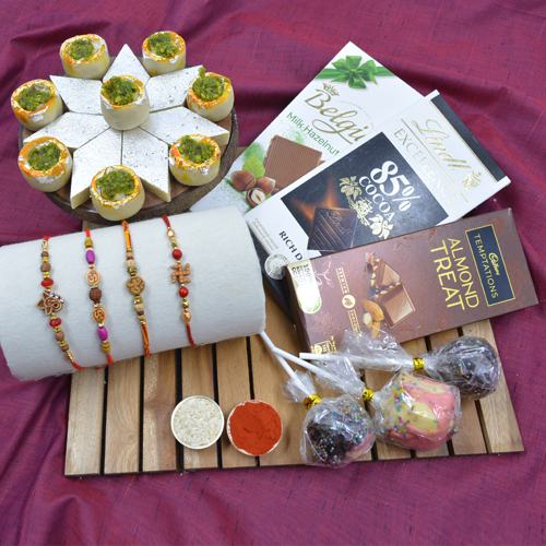 Fancy Rakhi Set of 4 with Haldiram Sweets N Assorted Chocolates