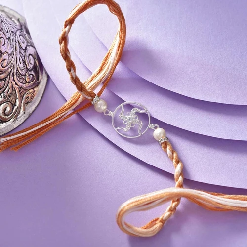 Stone- Studded Swastik Silver Rakhi