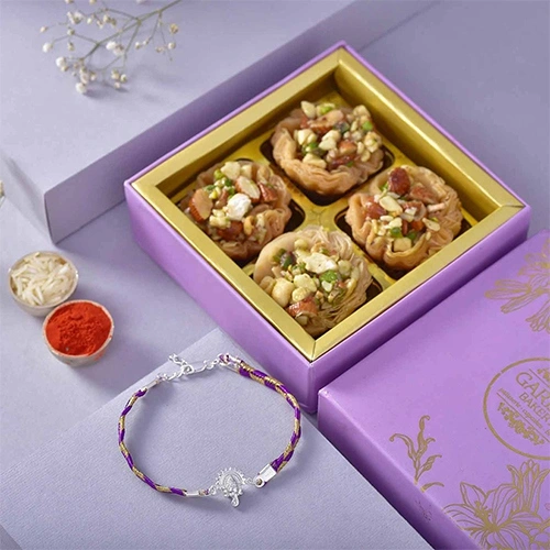 Charming Silver Rakhi with Tart Baklawa