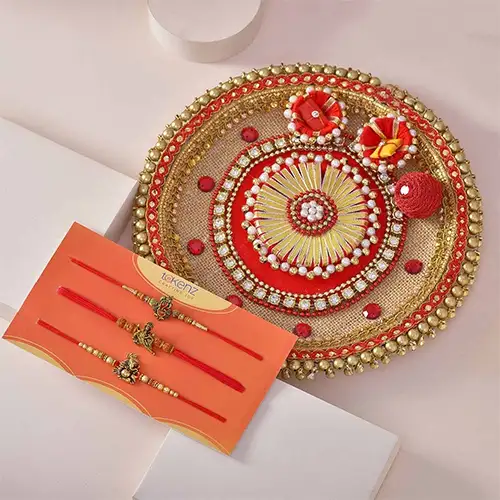 Enthralling Tripple Rakhi  N  Thali Combo