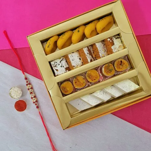 Enticing Stone Rakhi with Assorted Sweets