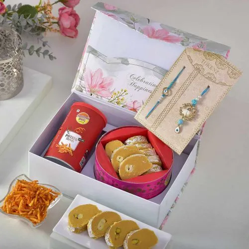 Gorgeous Bhaiya Bhabhi Rakhi with Treats Hamper