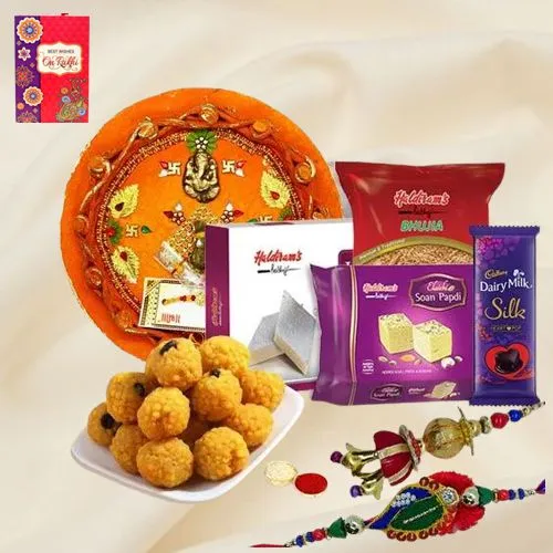 Haldriams Assortment with Bhaiya Bhabhi Rakhi, Cadbury Chocolate n Pooja Thali