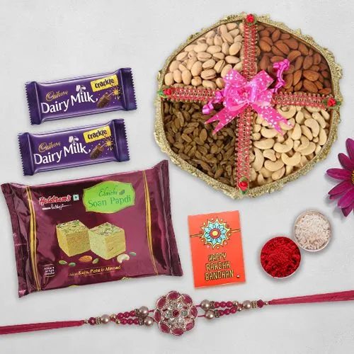 Astonishing Pearl Rakhi with Dry Fruits Chocolates n Sweets