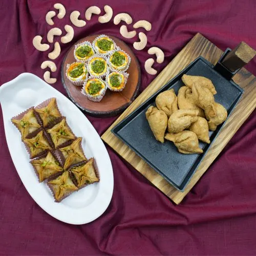 Tasty Pyramid Baklawa Mini Samosa n Haldiram Kaju Pista Flower Gift Combo