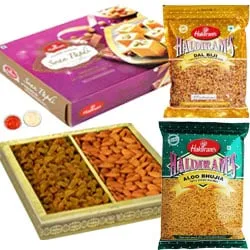 Delectable Combo of Haldirams Soan Papdi, Bhujia Sev, Dal Biji and Almonds with Raisins
