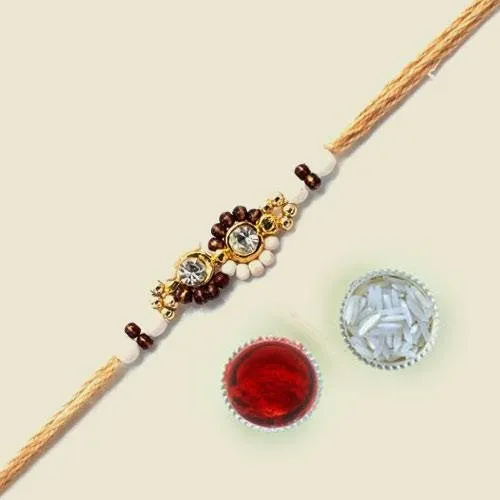 Exquisite Gift of Designer Rakhi with Roli Tika n Card