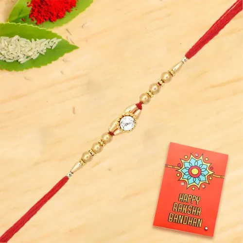 Ethnic Red Stone N Gold Bead Rakhi