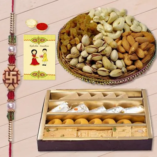 Pious Ganesh Rakhi with Assorted Sweets n Dry Fruits