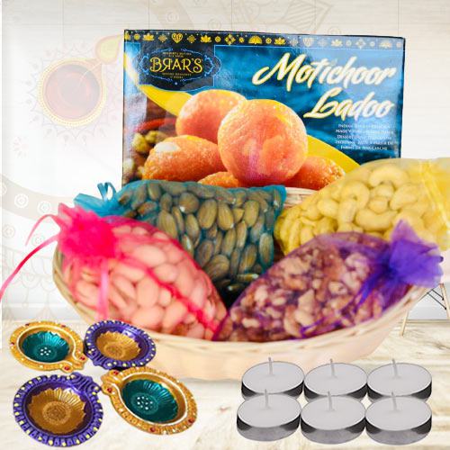 Enticing Gift Pack of Dry Fruits with Sweets, Candles N Diya