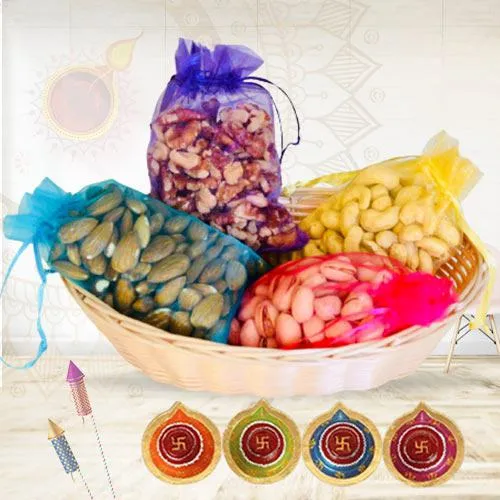 Ravishing Gift Pack of Dry Fruits with Diya N Laxmi Ganesh Idol