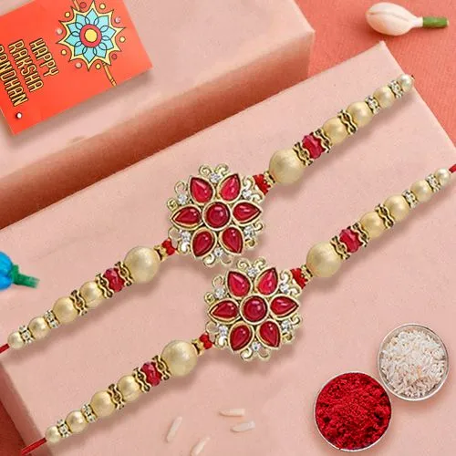 Dashing Pair of Fancy Rakhi with Roli, Chawal n Card