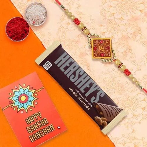 Appealing Rakhi with Hershey Chocolates, Roli, Chawal n Card