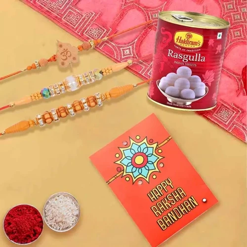 Enticing Set of 3 Rakhi with Haldiram Rasgulla