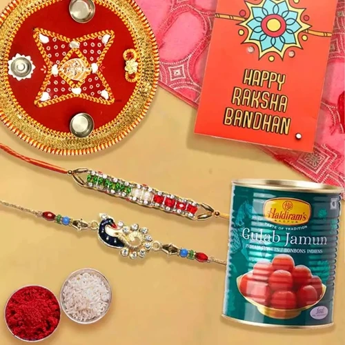 Splendid Set of 2 Rakhi with Gulab Jamun n Puja Thali