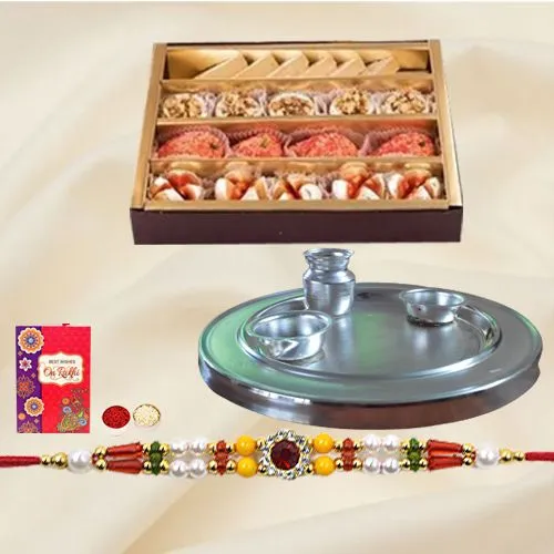 Sweets from Haldiram and Silver Plated Paan Shaped Puja Aarti Thali along with Rakhi